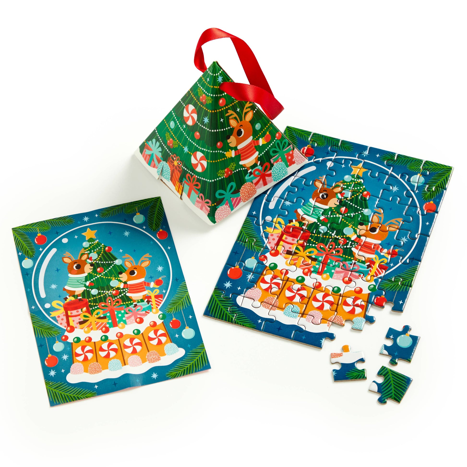 Christmas-themed puzzle with reindeer and presents, featuring a tree design on the packaging.