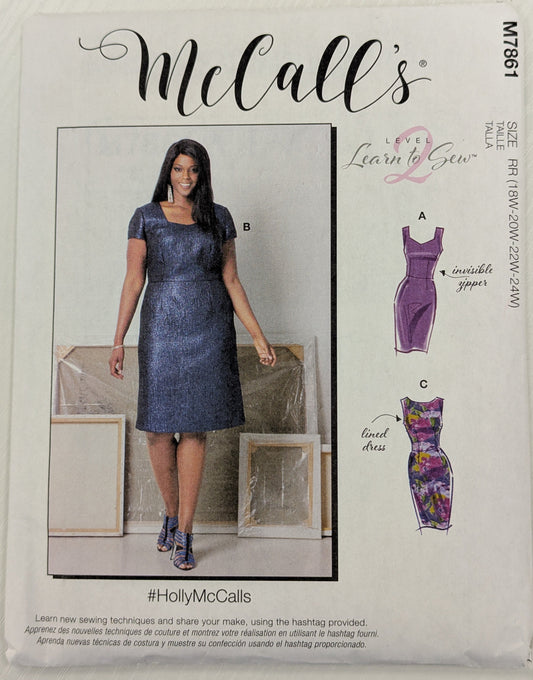 McCall's pattern packaging with a model wearing a dress and pattern pieces displayed.