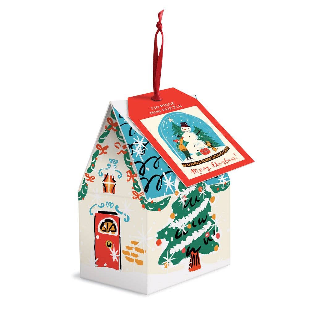Christmas-themed mini puzzle house shaped packaging with festive illustrations on a white background